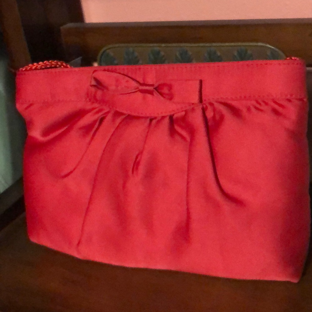 Small red clutch purse
